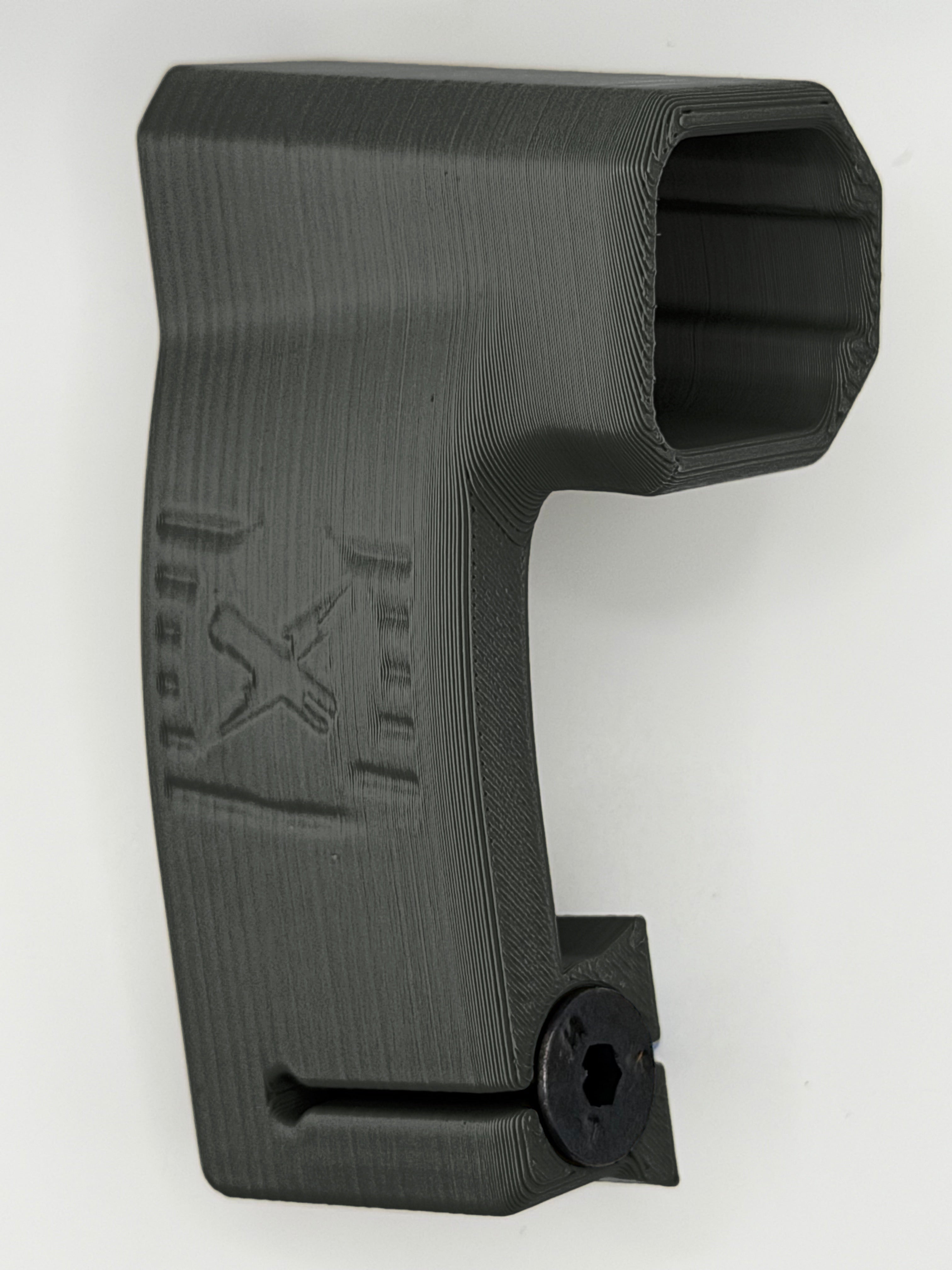 Tacstix Axon Flex helmet mount, black, angled view showing the screw and inside of the mount
