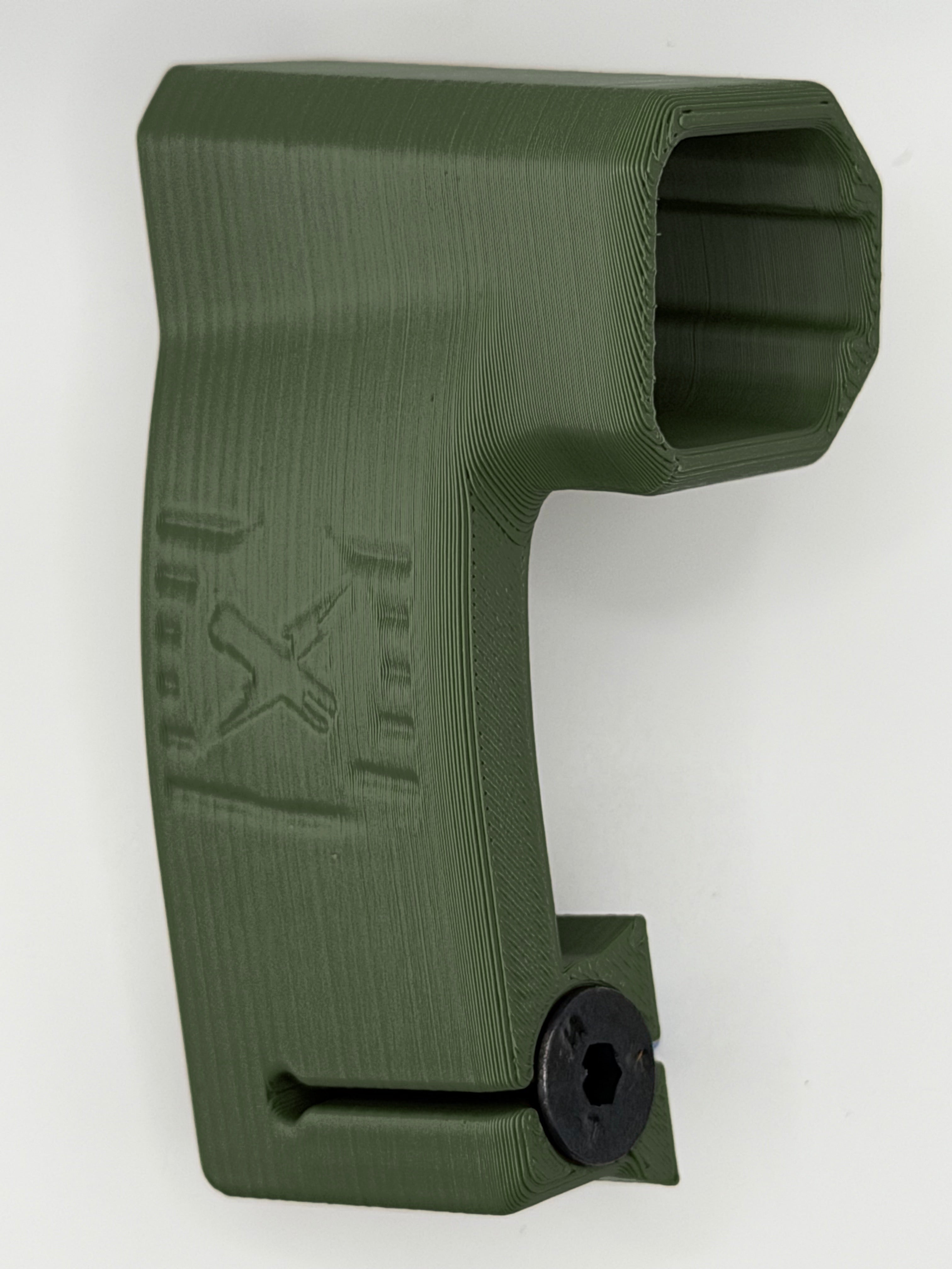 Tacstix Axon Flex helmet mount, green, angled view showing the screw and inside of the mount