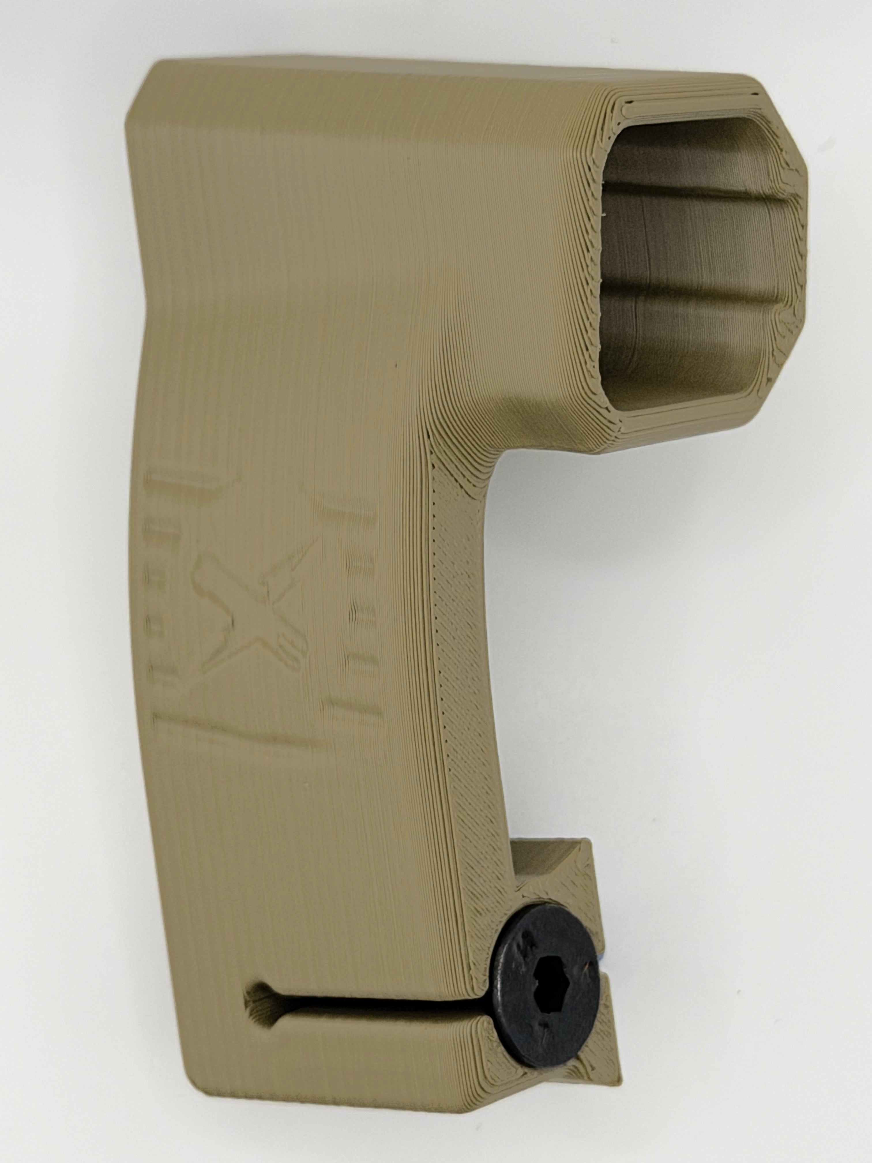 Tacstix Axon Flex helmet mount, tan, angled view showing the screw and inside of the mount